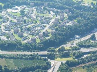 Near aerial view of Raigmore Interchange and Raigmore Estate, Inverness, looking SW.