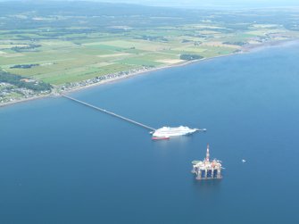 Oblique aerial view of Saltburn Pier and Saltburn, Invergordon, looking NE.