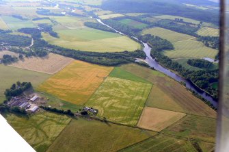 Oblique aerial view of the farm at Easter Urray on the River Conon, Easter Ross, looking WNW.