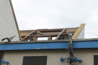 Historic building recording, Church, N elevation, Detail of burned-out area to roof, St Paul's Roman Catholic Church, Pennywell Road (4 Muirhouse Avenue), Muirhouse, Edinburgh