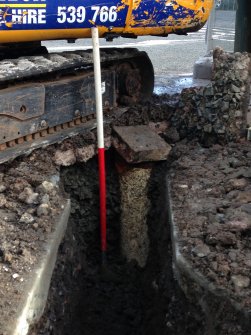 Watching brief, Service trench extending to existing water main, Abbey Coffee Shop, Buccleuch Street, Melrose