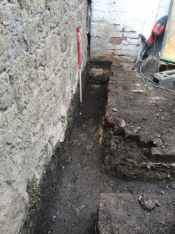 Watching brief, Post excavation shot of trenches to 0.4m depth to rear of coffee shop building, Abbey Coffee Shop, Buccleuch Street, Melrose