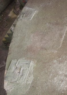 Cement patches on the outer edge of the gun pit marking the former position of the robbed brick pillars that support the mezzanine in the NE Emplacement