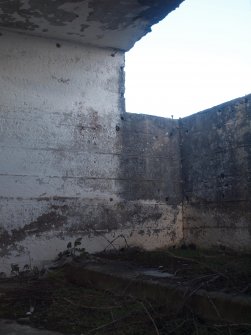 The NE corner of the upper compartment in the upper tier at the NE end of the building of the building 