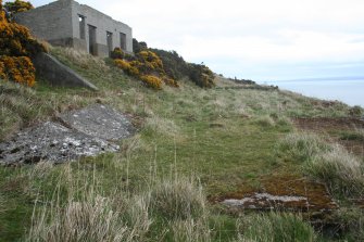 View of the barracks (9.36) from the WNW with the two buildings to the N (9.34, 9.33) on the terraces above 