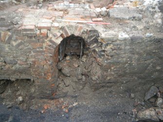 Archaeological excavation, Arch [023] full extent of S face, Joppa Salt Pan Works