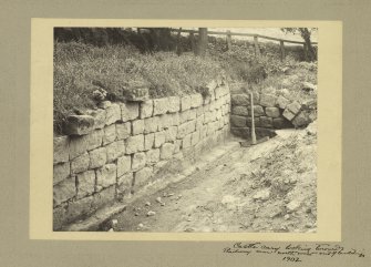 Excavation photograph showing Castlecary Roman fort, looking towards railway near north west end of building.