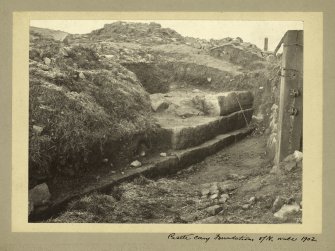 Excavation photograph of Castlecary Roman fort showing foundations of north wall.