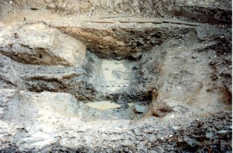 Data structure report plate 3: 'Poste-excavation view of ditch 76 showing terminal 143 in foreground looking E', Archaeological excavation, St. Patrick's Church, Cowgate, Edinburgh
