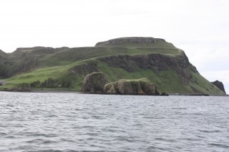 Historic Building Survey photograph, From SE, Coroghan Castle, The surrounding landscape seen from the sea, Coroghon Castle, Canna
