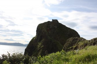 Historic Building Survey photograph, From NW, Castle on side of stack, Coroghon Castle, Canna