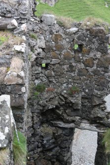 Historic Building Survey photograph, From S, Internal N wall in Room D, Coroghon Castle, Canna