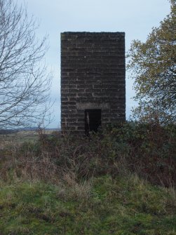 The concrete brick-built water tower from the WSW