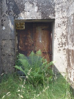 The original sheet metal doors at the entrance to the NW gun-pit (NS 45132 57213) 