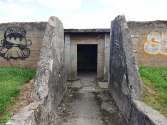 The path approaching the central entrance of the SE magazine as it passes through the protective blast wall