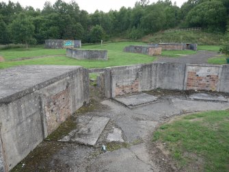 The demolished ammunition lockers on the WSW side of the SE gun-pit (NS 68197 59817)