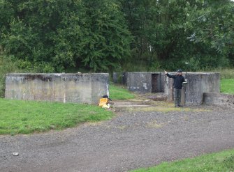 The W gun-pit from the ESE (Alex Hale surveying, right)