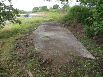 The concrete base of a camp building (NS 45395 57192) from the SW