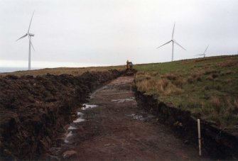 Report illustration 3: 'Road to Turbine 13 under excavation', Archaeological works, Ardrossan Windfarm Extension, Ardrossan, North Ayrshire