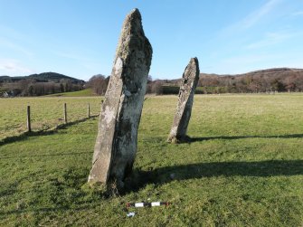 Digital photograph of panel in context with scale, from Scotland's Rock Art Project, Nether Largie South Standing Stone, Kilmartin, Argyll and Bute
