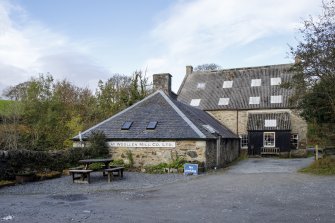 General view from south of former waterwheel house, dye house and press house.