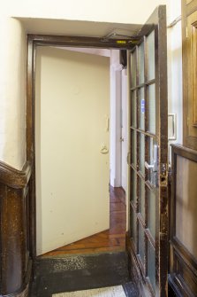 Third floor. Detail of double doors, including fire door onto southeast staircase. 