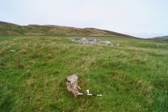 Digital photograph of panel in context with scale, from Scotland’s Rock Art Project, Cairnholy 8, Dumfries and Galloway