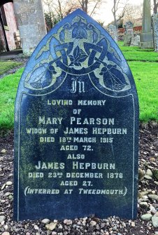 View of gravestone of Mary Pearson (died 1915) incorporating Art Nouveau rose design.