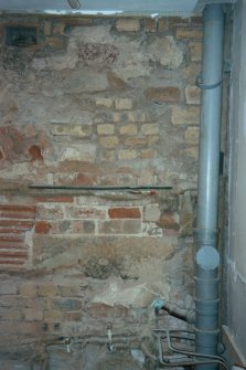 Historic building recording, Ground floor N wall, W end, brick blocking, and lintel, 126-128 High Street, Dunbar