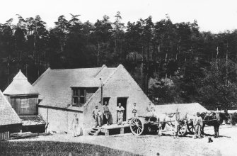 Peterculter, Lower Kennerty Mill.
Copy of a photograph showing an exterior view of the mill with mill hands, horses and cart etc., c.1890.
