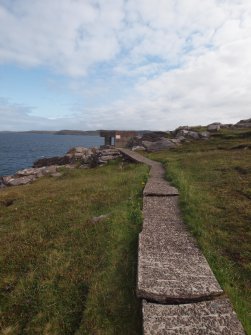 East Light: the concrete paving slabs of the path leading to the searchlight from the WSW 