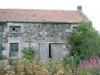 Historic building survey, E exterior wall of farmhouse showing double doorway, ground floor windows and first floor windows, The Steading, Eastfield Road, Edinburgh