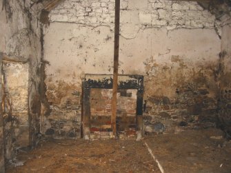 Historic building survey, E interior wall of room J with bricked up hearth, S facing window and raised concrete platform in N portion of the room shown, The Steading, Eastfield Road, Edinburgh