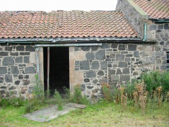 Historic building survey, W exterior wall of cattle-byre with entrance and tile roof shown and adjoining W exterior wall of apartment M with tile roof and part of window shown, The Steading, Eastfield Road, Edinburgh