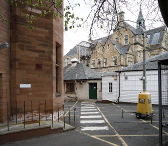 Main Building East Wing with Sciennes Primary School beyond.  View from south west.
