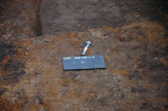 Evaluation photograph, Trench 1, S edge of feature 4, Proposed play area, Brodie Castle, Moray