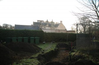 Evaluation photograph, Trench 1, looking S towards castle, Proposed play area, Brodie Castle, Moray