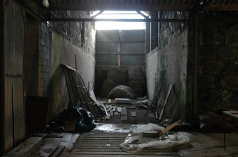 Survey photograph of Steading Building 4, interior looking S to silage camp, Blairs College and Estate