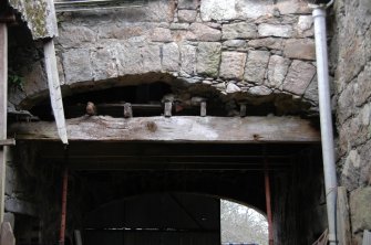 Survey photograph of Steading Building 13, interior looking E along inside of S wall, cart bays, Blairs College and Estate 