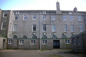 Survey photograph of  New College, W wall E wing from courtyard, Blairs College and Estate