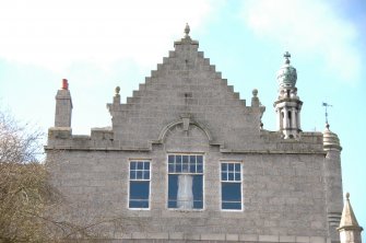 Survey photograph of New College, E gable of N wing showing Upper Library window, Blairs College and Estate 