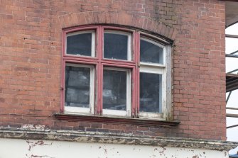 Detail of tripartite window, Main St