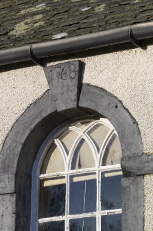 South elevation Detail of  central arched  arched window with 1786 date