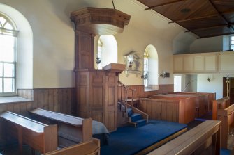 View of pulpit  with sounding board and staircase from east
