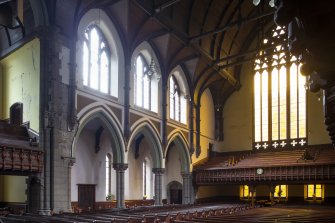 General view of nave, and south gallery from northwest
