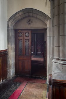 Detail of east aisle doorway to main east entrance lobby