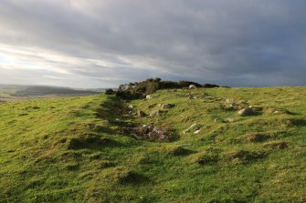 Photograph of Durn Hill, view of earthworks defining entrance to fort.