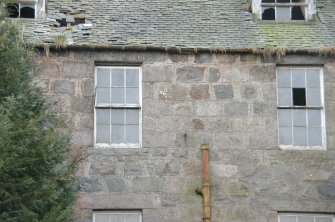 Survey photograph of Menzies House, detail of stonework in N wall showing small black pinnings, Blairs College and Estate 