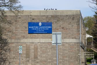 Detail of signage on south side of church