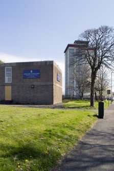 View of signage and tower blocks from west  from Montgomery Road